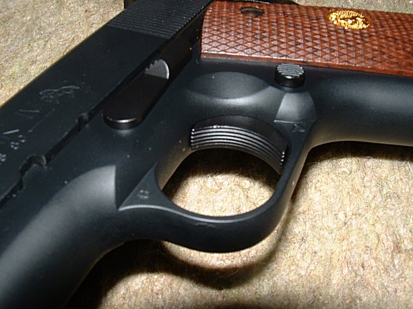Trigger features grooves for a firm purchase when firing.