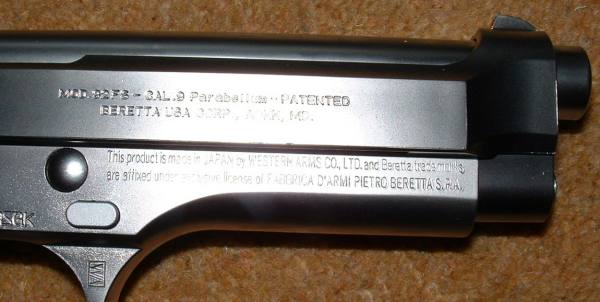 Beretta USA markings and verbose WA licence disclaimer.