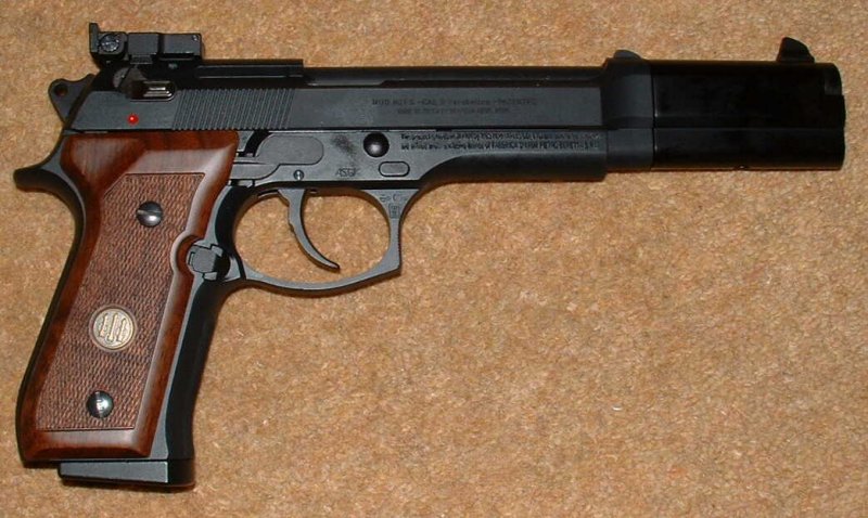 Wood grips, target sights and metal compensator distinguish this from a normal WA M92FS.