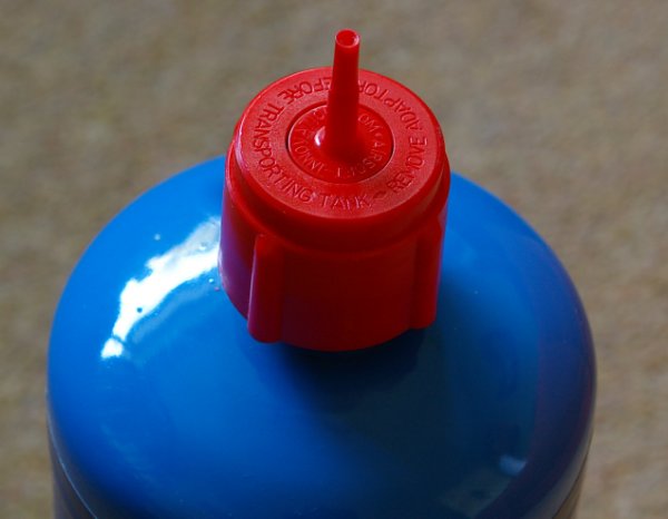 V5 Propane adaptor is little changed, except that it's now made of plastic.