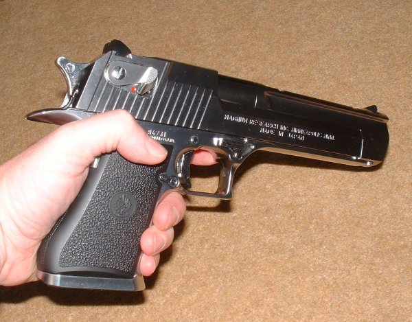The Desert Eagle is a truly huge pistol. Not for the dainty of hand...