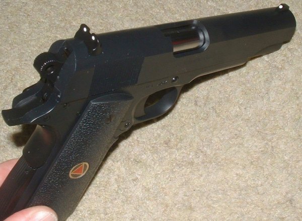 White dotted sights an unusual boon on 1911s - Could this by why it's so accurate?