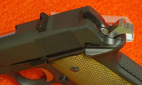 Flatened rear slide and forward mounted rear sight is replicated well.