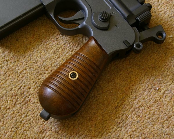 Fake wood grips are quite realistic in appearance, especially compared to Marushin replica.