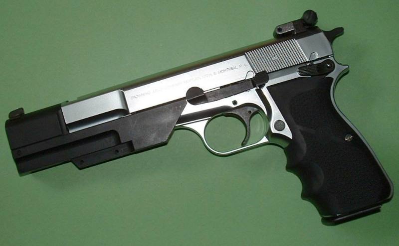 JAC Browning Hi Power Target 1 - note huge muzzle weight and real steel Hogue grips.