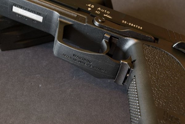 Ambi mag release in trigger guard - Note markings under frame and trigger guard