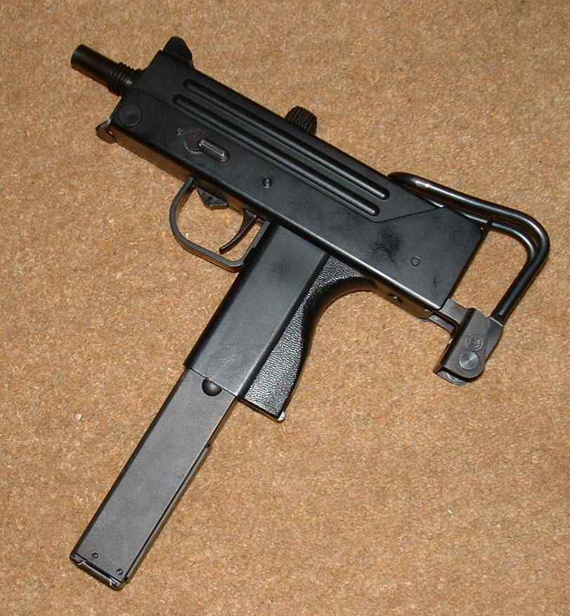 Compact SMG with lots of metal (internally) and collapsible stock.