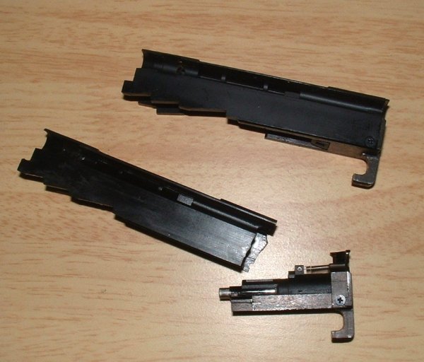Upper bolt is complete - Lower two pieces are broken unit.