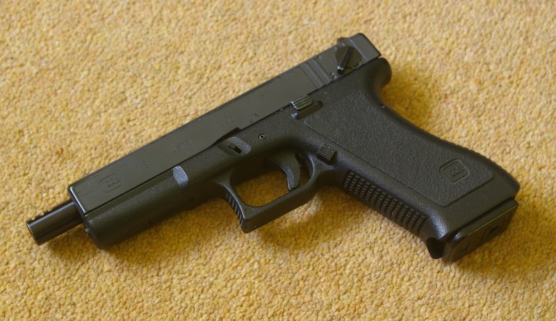 Less shiney plastic and long barrel distinguishes this from a KSC Glock 18C
