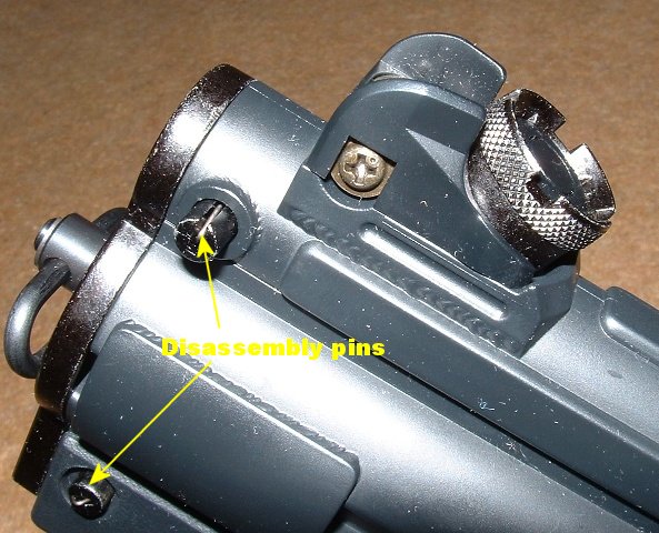 Rear sight nicely reproduced and usable. Disassembly pins, with retaining latches, visible.