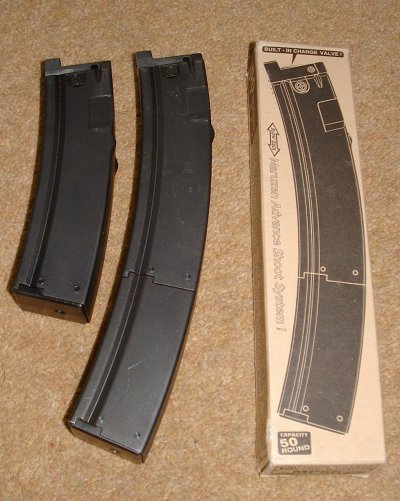 30 round mag (left) with 50 round extended version.