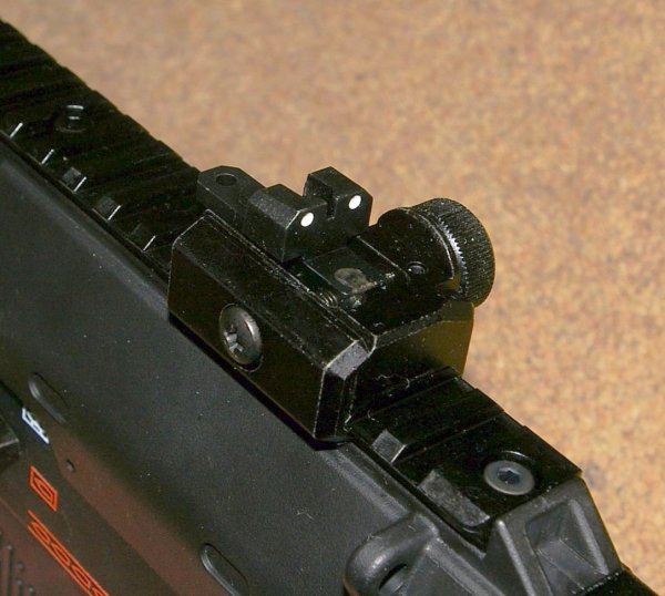 Rear sights (and front) flip up to convert from three dot pistol to rifle style - Very clever - Or you can fit a scope!