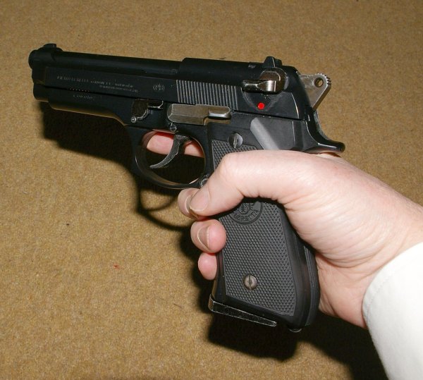 Beretta 92 is a very comfortably sized gun for most hands.