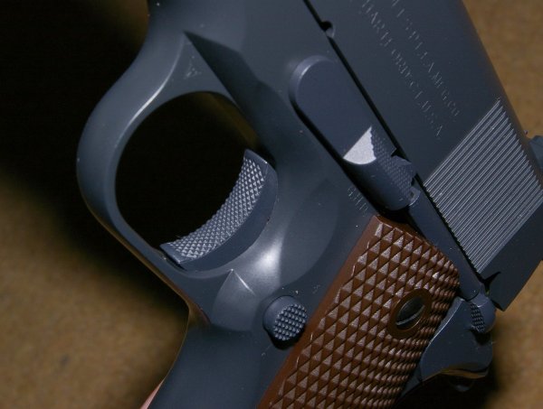 Heavily checkered trigger featured as on GI Issue 1911A1s.