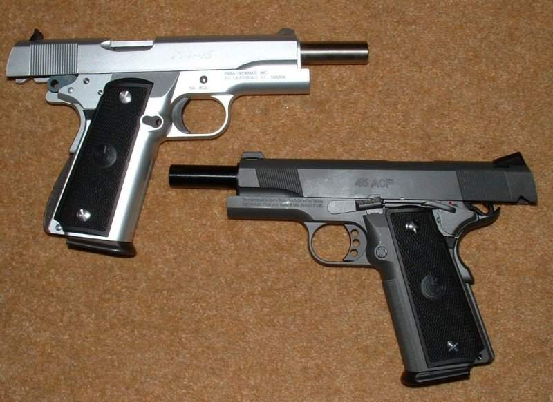 Next to the HRT special, silver P14-45 looks the more standard gun, which it is.