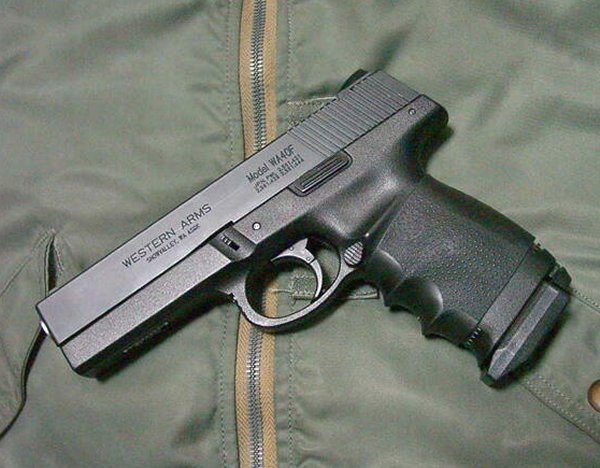 The earlier Sigmas had heavyweight slides, but no S&W trademarks.