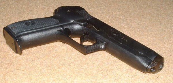 Note metal slide end and fishscales on front of trigger guard.