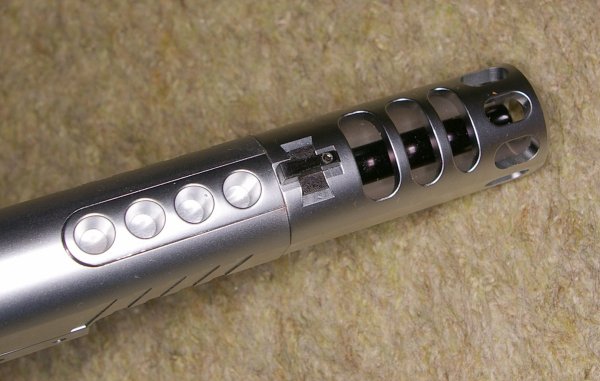 Hybrid ports look fake, but Compensator covers extended inner barrel.