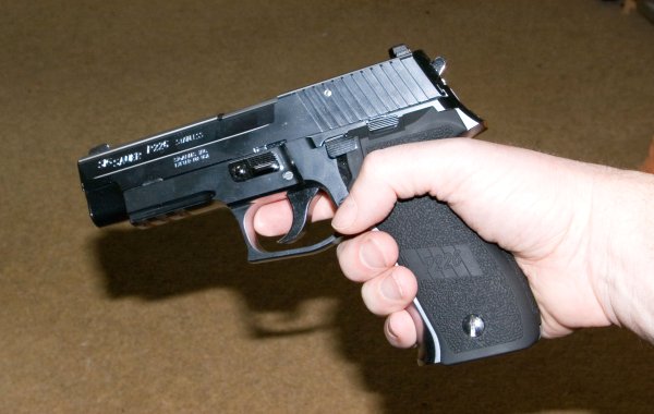Medium sized, tactical pistol, if a little bling for the military look.