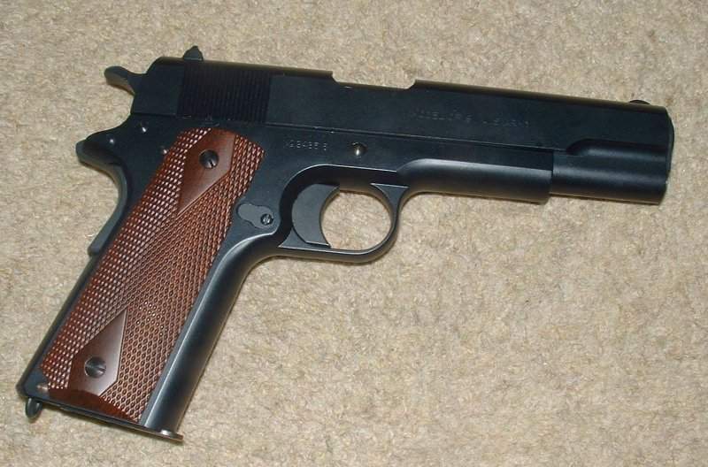 As you would expect, the original 1911 has few frills - Note long trigger, though.