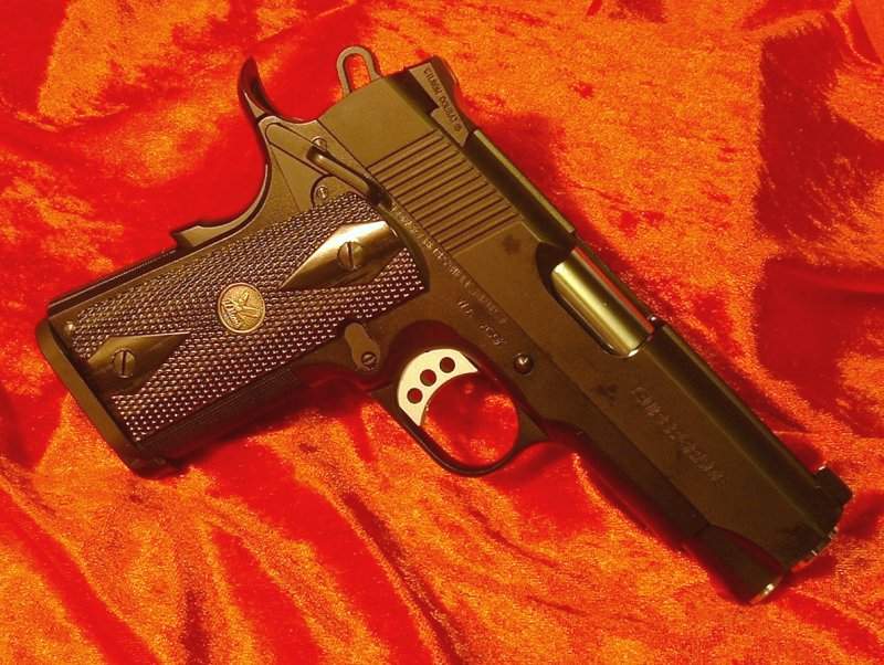 A 1911, but in a compact form.